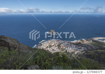 Aerial view of old town Garachico from Mirador de Garachico view point. Colorful houses and harbor. Ocean shore with lava rock pools. Popular tourist destination, Tenerife Canary Islands. 127098377