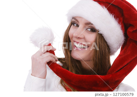 Woman in santa claus hat free and happy Woman in santa claus hat free and happy 127100579