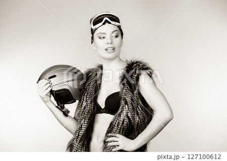 Woman wearing sexy winter sport outfit 127100612