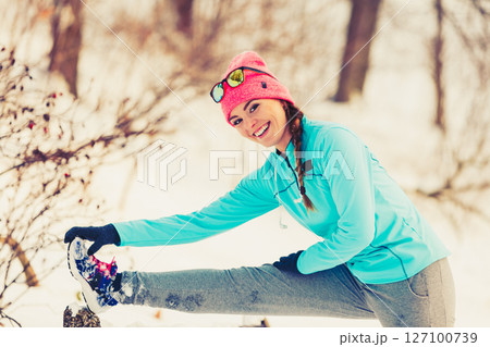 Girl exercising on bench Girl exercising on bench 127100739