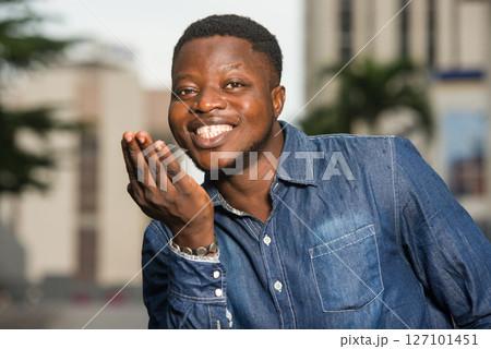 close up of young african man, happy. close up of young african man, happy. 127101451