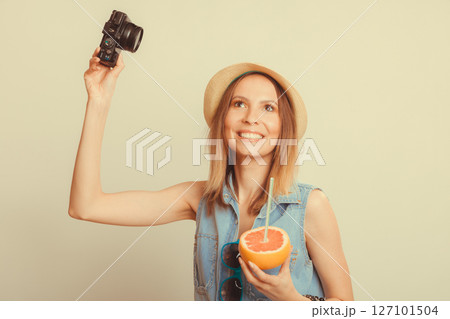 Woman taking selfie self picture with camera. Woman taking selfie self picture with camera. 127101504