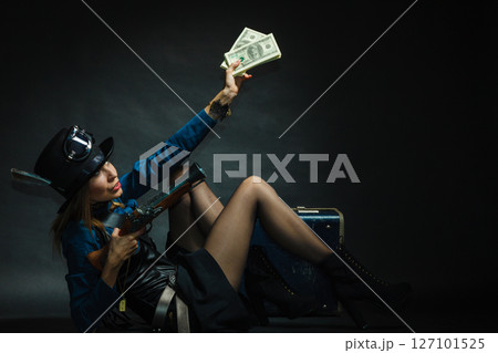 Steampunk girl with cash. 127101525