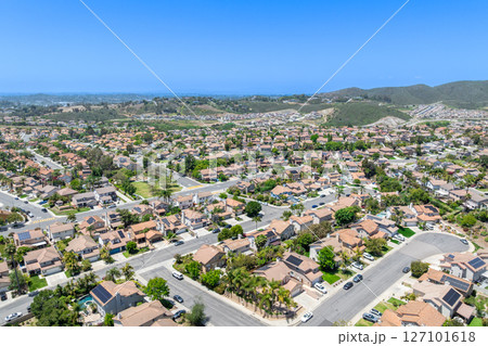 Aerial view of San Marcos neighborhood, with houses and street. South California Aerial view of San Marcos neighborhood, with houses and street. South California 127101618