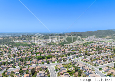 Aerial view of San Marcos neighborhood, with houses and street. South California 127101621