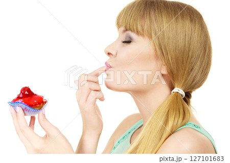 Woman holds cake strawberry cupcake Woman holds cake strawberry cupcake 127101683