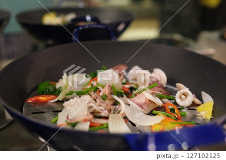 Stir fried clams with chili paste. Stir fried clams with chili paste. 127102125