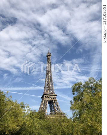 Eiffel Tower Rising into the Cloudy Sky Eiffel Tower Rising into the Cloudy Sky 127102351