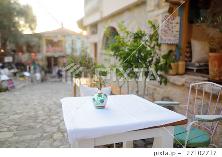 National cafe tables on the street of the Old Bar Town in Montenegro 127102717