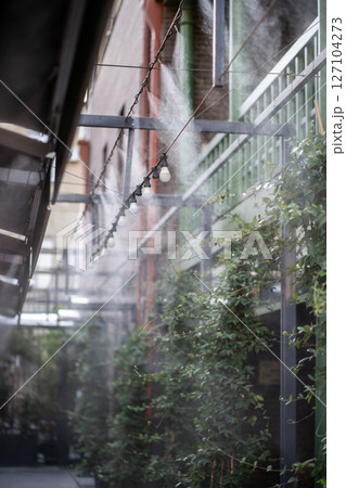 Prevention of overheating or heatstroke. Air conditioning and water spray system for cooling and fog Prevention of overheating or heatstroke. Air conditioning and water spray system for cooling and fog 127104273