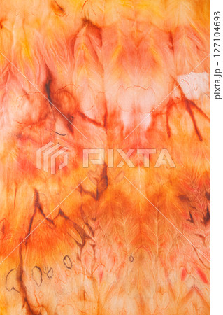abstract pattern on silk fabric texture in yellow and brown tones 127104693