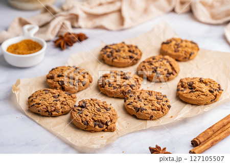 Golden chocolate chip cookies 127105507