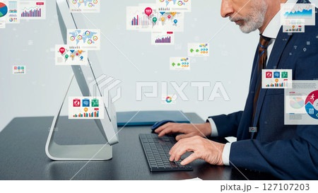 オフィスで作業するビジネスマンと電子書類のコンセプトビジュアル オフィスで作業するビジネスマンと電子書類のコンセプトビジュアル 127107203