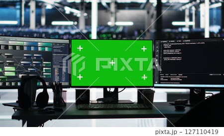 Mockup PCs in data center control hardware energy usage using node tree tech interfaces. Isolated screen workstations automate and supervise operations in server farm using visual programming 127110419
