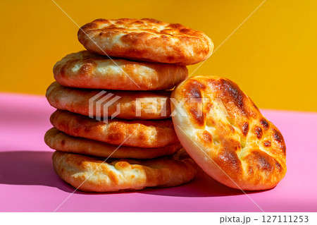 tempting frybread in the industrial corner on a pastel yellow background 127111253