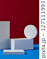 Empty white podiums to display products, goods decorated on red and blue background. Front view, minimal scene for products showcase, promotion display 127111993