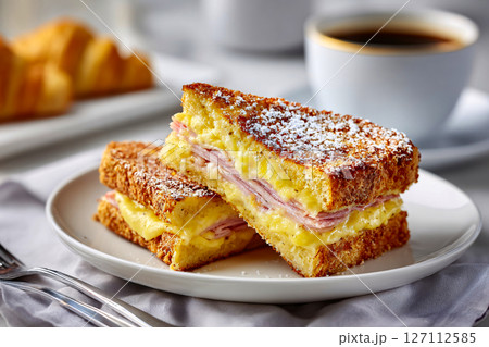 tempting monte cristo sandwich in the cozy corner on a white background 127112585