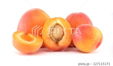 Fresh Vibrant Apricots Perfectly Displayed with Sliced and Whole Fruits 127115171