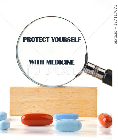 The concept phrase PROTECT YOURSELF WITH MEDICINE. Self care and prevention concept The concept phrase PROTECT YOURSELF WITH MEDICINE. Self care and prevention concept 127117071
