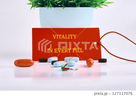 The concept phrase is VITALITY IN EVERY PILL. Balance, eat, vitality, exercise, sleep, rest and care concept 127117076