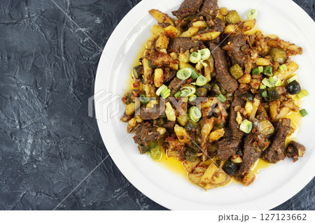 Tatar azu from beef with pickles. Tatar azu from beef with pickles. 127123662