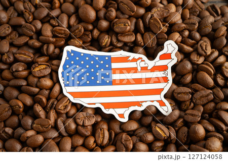 US America flag on coffee bean, import export trade online commerce. US America flag on coffee bean, import export trade online commerce. 127124058