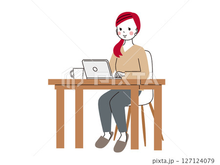 自宅テーブルでパソコン仕事をしている女性 127124079