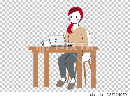 自宅テーブルでパソコン仕事をしている女性 127124079