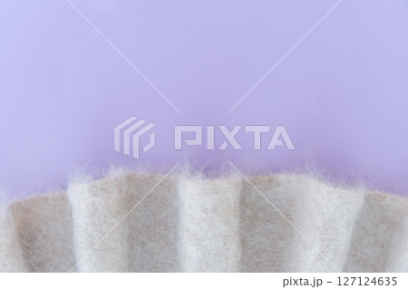 Soft white mohair wool fabric with purple background and pleats 127124635