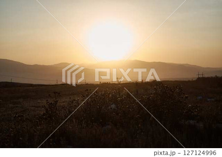 a sunset in the desert beyond the mountains, Armenia 127124996