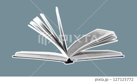 Hand flipping through the pages of a book in a library, symbolizing knowledge and education. A mix 127125772