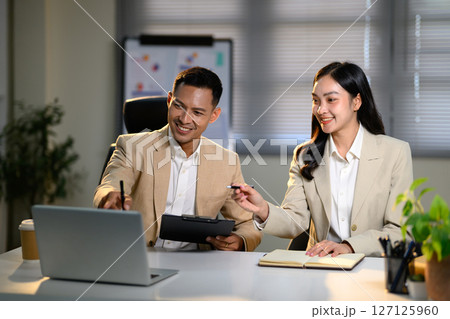 Two colleague discussion on office workplace Two colleague discussion on office workplace 127125960