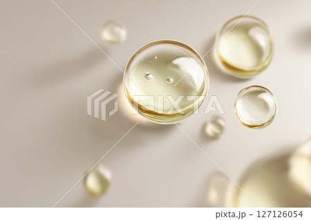 宙を漂うベージュのオイルのイメージ 127126054