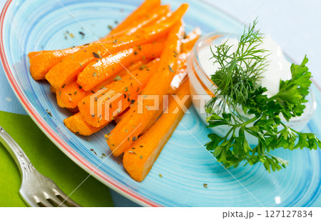Carrot sticks with creamy dip Carrot sticks with creamy dip 127127834