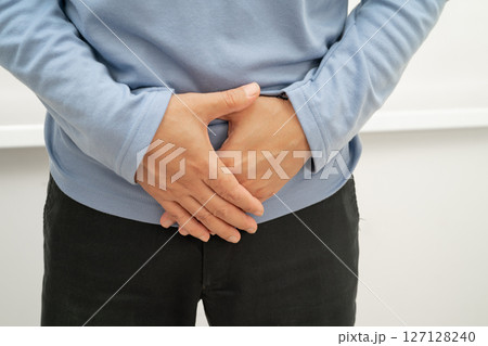 Hernia, Asian man stomach ache, abdominal pain and urology problem health. 127128240