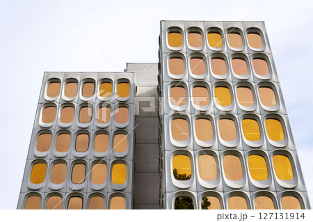 Facade of prefabricated modular concrete on the functionalist office CBR Building, Watermael-Boitsfort, Bussels, Belgium Facade of prefabricated modular concrete on the functionalist office CBR Building, Watermael-Boitsfort, Bussels, Belgium 127131914