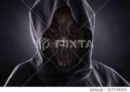 Portrait of a creepy monster over dark misty background 127134324