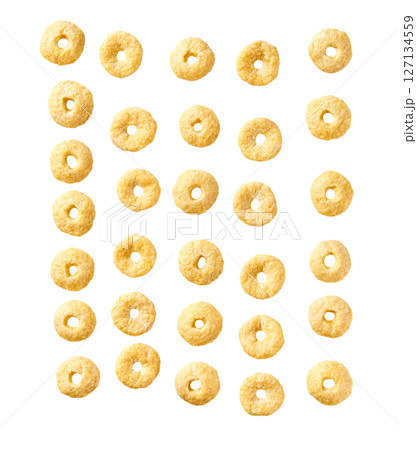 Whole grain cereal rings isolated on white background top view. Whole grain cereal rings isolated on white background top view. 127134559