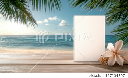 Tropical Beach Photo Frame Mockup with flowers, against a backdrop of a tropical beach 127134707