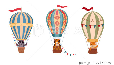 Cute animals flying on hot air balloons. Retro flying hot air balloon with animals on board flat vector illustration set. Animal characters flying on air transport 127134829