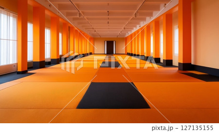 A long corridor with orange walls and black and orange flooring creates a striking minimalist design A long corridor with orange walls and black and orange flooring creates a striking minimalist design 127135155