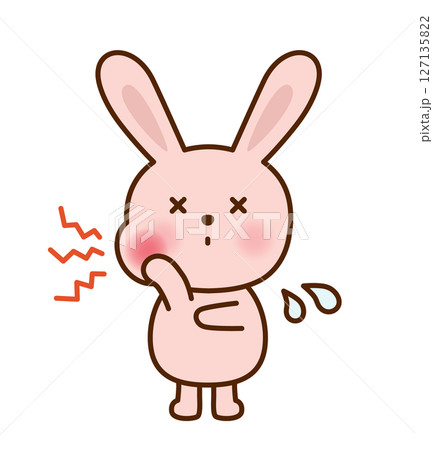歯が痛くて顔をしかめるかわいいうさぎのイラスト 127135822