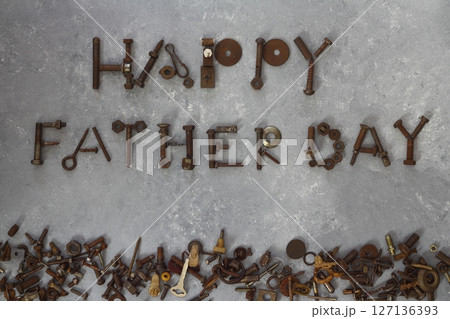 Kid's happy fathers day drawing and color pencils over white Kid's happy fathers day drawing and color pencils over white 127136393