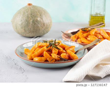 Pumpkin recipe homemade gnocchi on pastel color background Pumpkin recipe homemade gnocchi on pastel color background 127138147