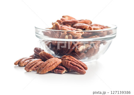Peeled pecan nuts  isolated on white background. 127139386