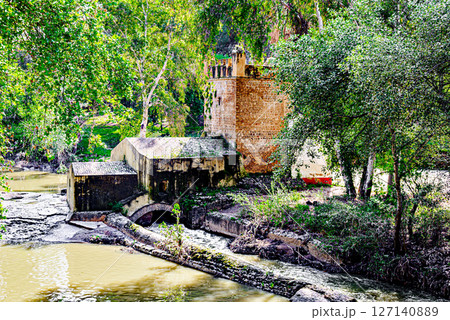Algarrobo flour mill next to the banks of the Guadaira River, within Oromana Park in Alcala de Guadaira, Seville 127140889