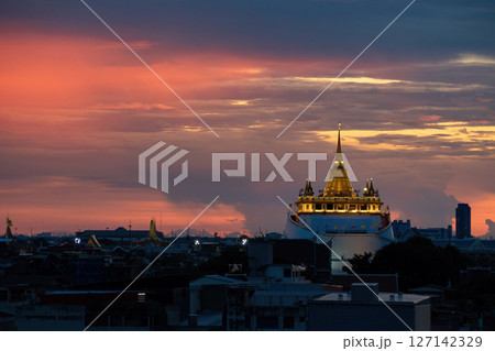 Golden Mountain, or Wat Saket, is an iconic Buddhist temple in Bangkok known for its gleaming golden stupa atop an artificial hill. Visitors can climb 344 steps to the summit for panoramic views. Golden Mountain, or Wat Saket, is an iconic Buddhist temple in Bangkok known for its gleaming golden stupa atop an artificial hill. Visitors can climb 344 steps to the summit for panoramic views. 127142329