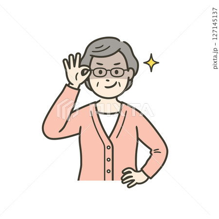 眼鏡を上げて悪巧みしてニヤける高齢女性 眼鏡を上げて悪巧みしてニヤける高齢女性 127145137