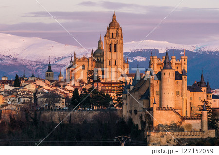 Segovia Alcazar and Cathedral stand majestically against the snowy Guadarrama mountains. Segovia Alcazar and Cathedral stand majestically against the snowy Guadarrama mountains. 127152059
