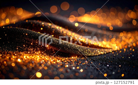 Bright orange and yellow flame energy glows with a star-like motion in a close-up texture of a burning stove 127152791